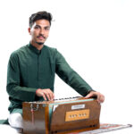 Aakar Surti With Harmonium from Pune, Accompanying Pradyumna Karpur
